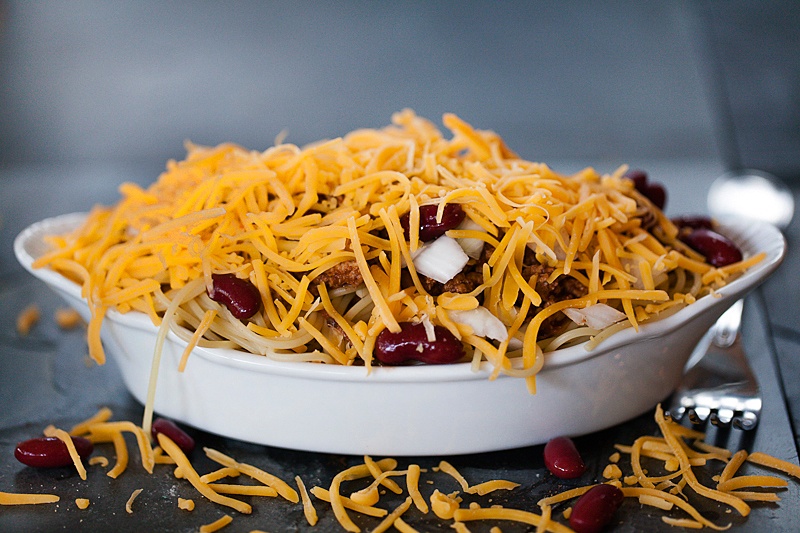 Cincinnati Turkey chili made with turkey topped with cheese, onion, red kidney beans and hot sauce