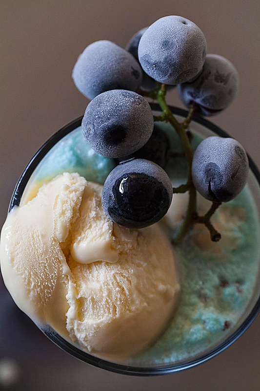 Ice cream soda made with a Seagram's wine cooler and muddled grapes