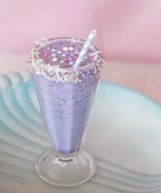 purple frozen cocktail with sprinkles