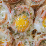 Baguette breakfast casserole with Canadian bacon, eggs, and melted Gruyere cheese, recipe and photo by Jackie Alpers
