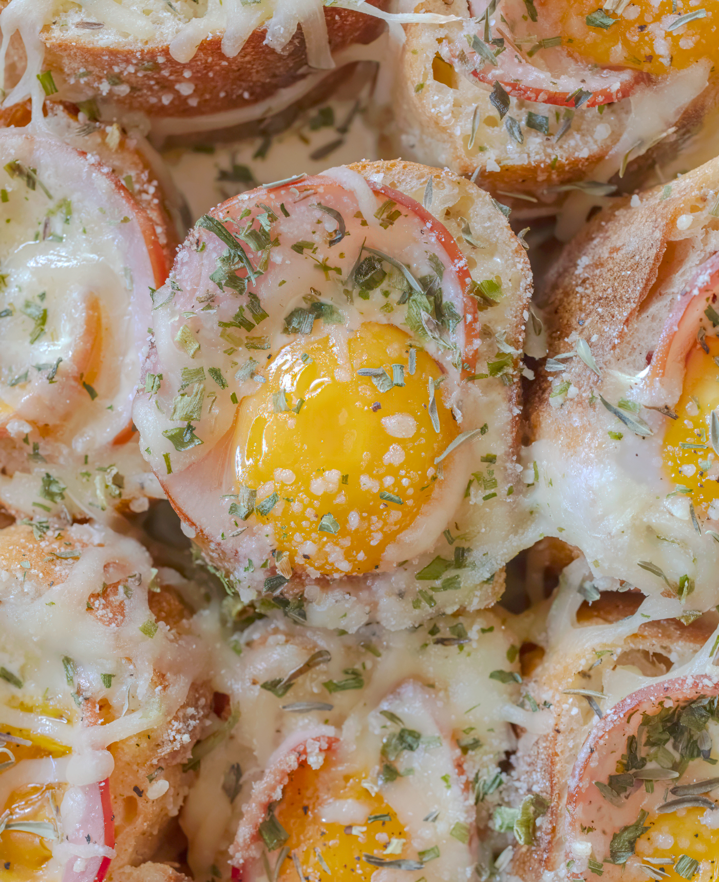 Baguette breakfast casserole with Canadian bacon, eggs, and melted Gruyere cheese, recipe and photo by Jackie Alpers