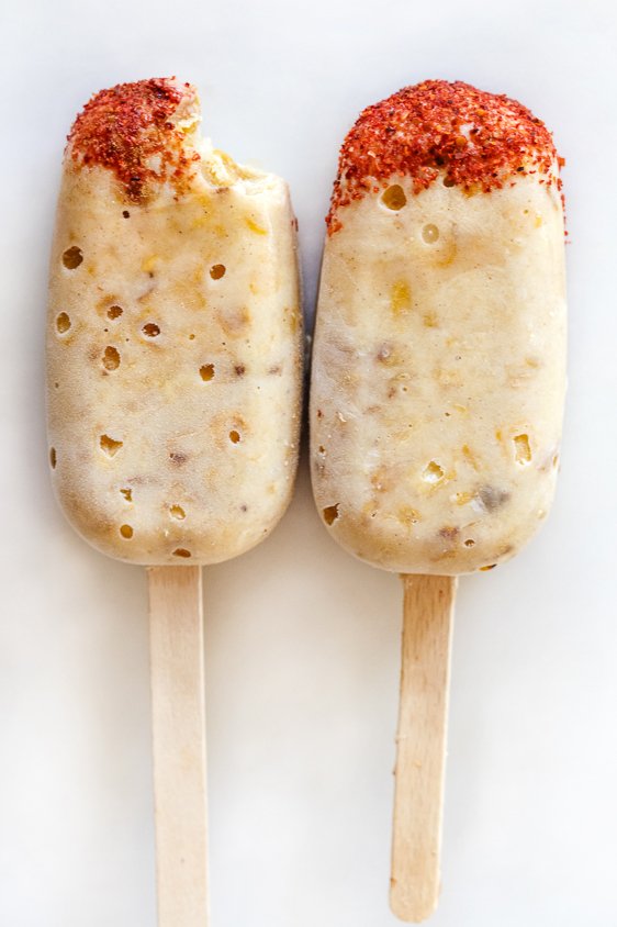 sweet corn paletas with Tajin