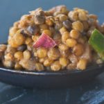 big spoonful of lentil caviar with a Sonoran vinaigrette and serrano peppers, red onions
