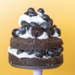 mini brownie stack cake with berries and cream