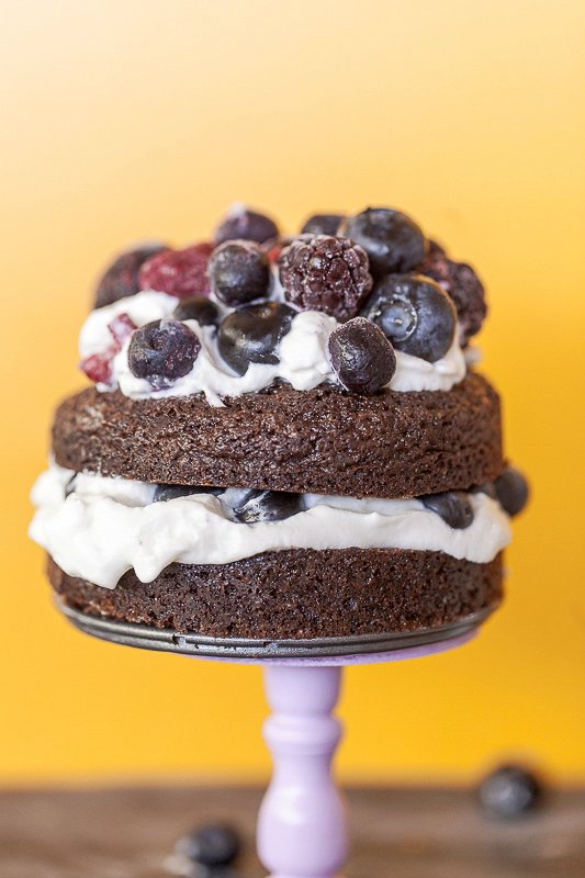 mini brownie stack cake with berries and cream