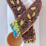 chocolate biscotti with sprinkles pistachios and coffee