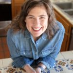 Portrait of Taste of Tucson Cookbook author in her Mexican tiled kitchen