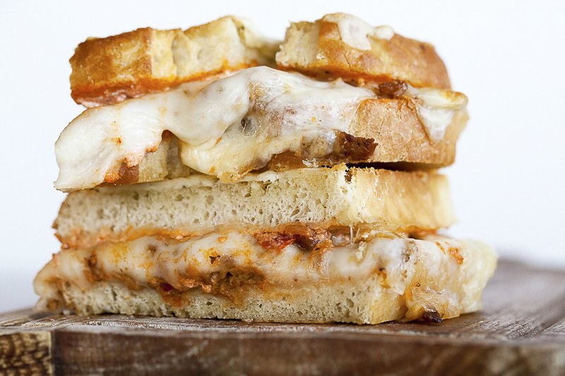 lasagna grilled cheese sandwich with melted cheese crust on Italian bread with sausage,