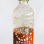 Bottle of homemade Sriracha Lime salad dressing