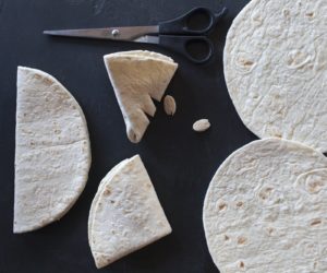 prep photo illustrating how to make tortilla snowflakes