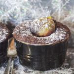 Fresh fig nestled on top of a dark chocolate coffee figgy pudding cake in a Le Creuset ramekin, recipe and photo by Jackie Alpers