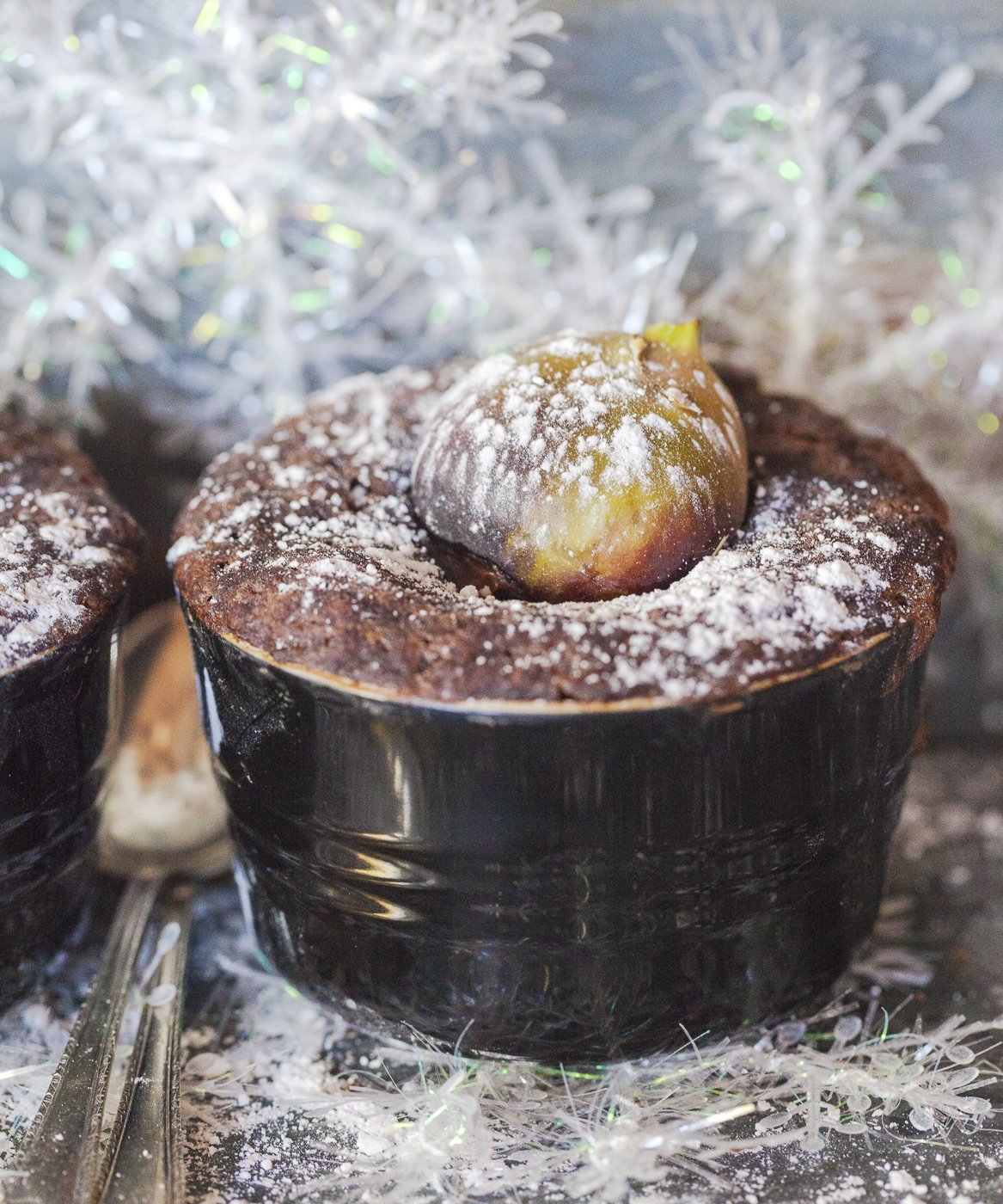 Fig nestled on top of a chocolate pudding in a Le Creuset Ramekin