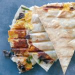 grilled, cheese crusted quesadillas with carne asada and crispy corn tortillas inside