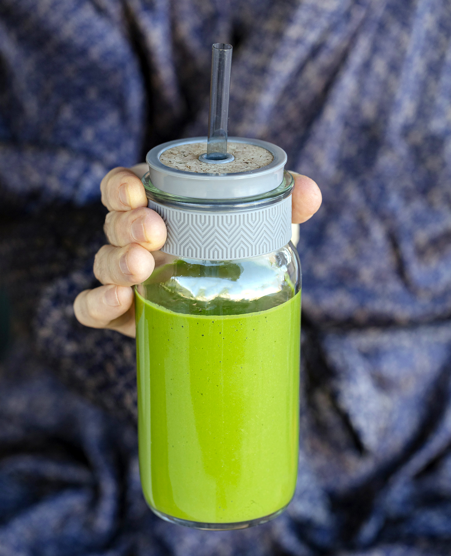 Yellowstone tribue recipe of a man in a bathrobe holding a green smoothie.