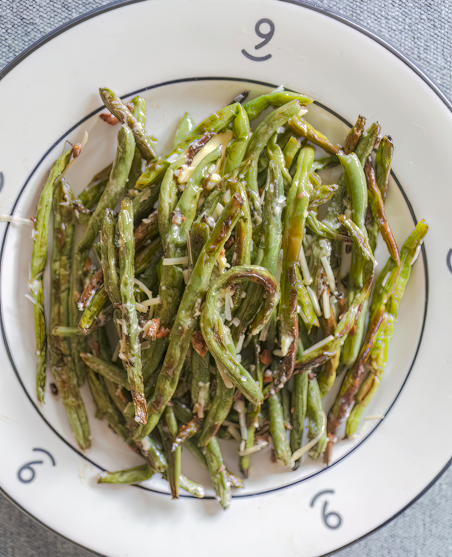 Pan roasted green beans with garlic and butter on a 6666 Ranch plate from Yellowstone cookbook author Jackie Alpers