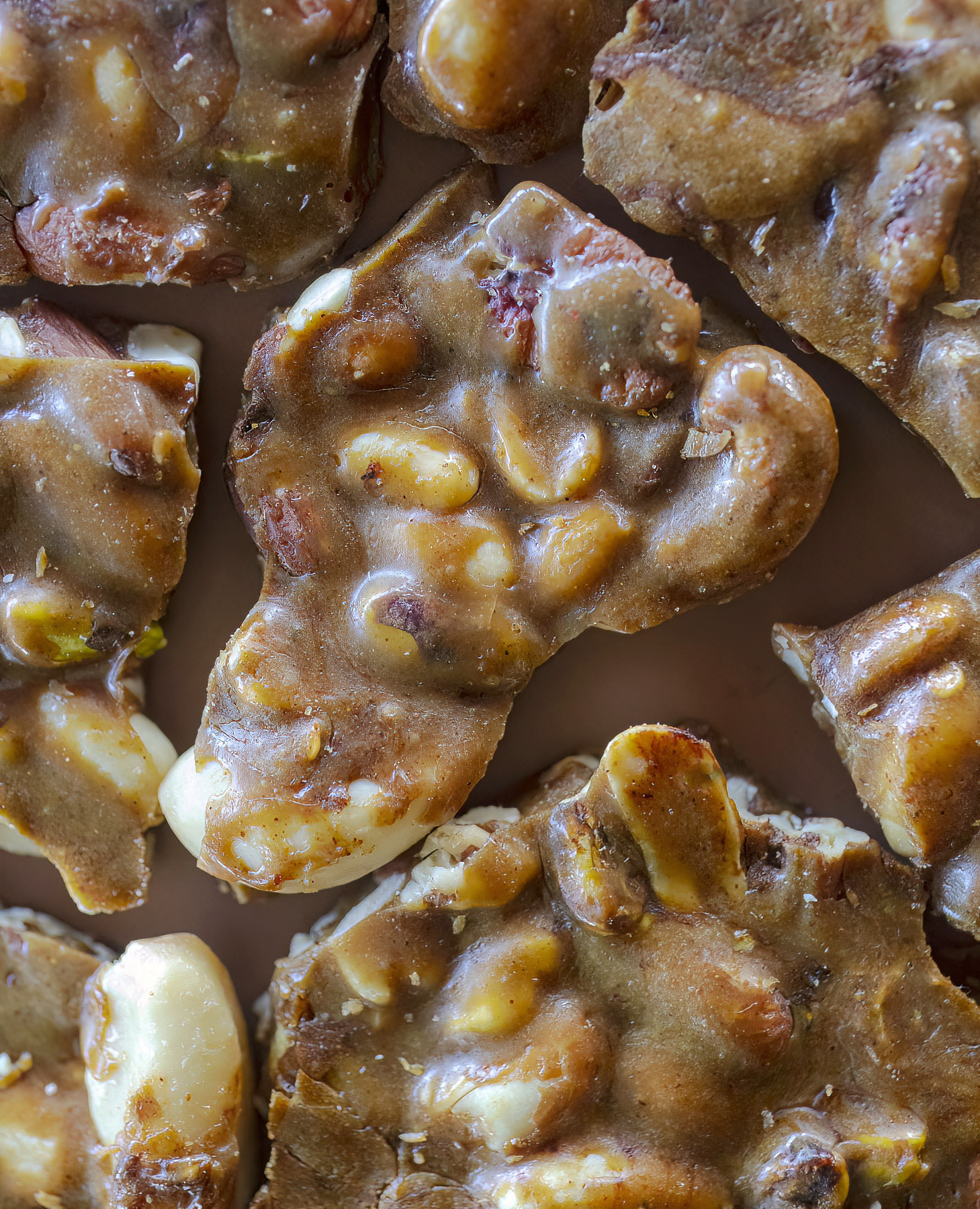 hunks of candy nut brittle with cashews, peanuts