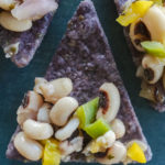 super lucky black-eyed peas cowboy caviar served on blue corn tortilla chips