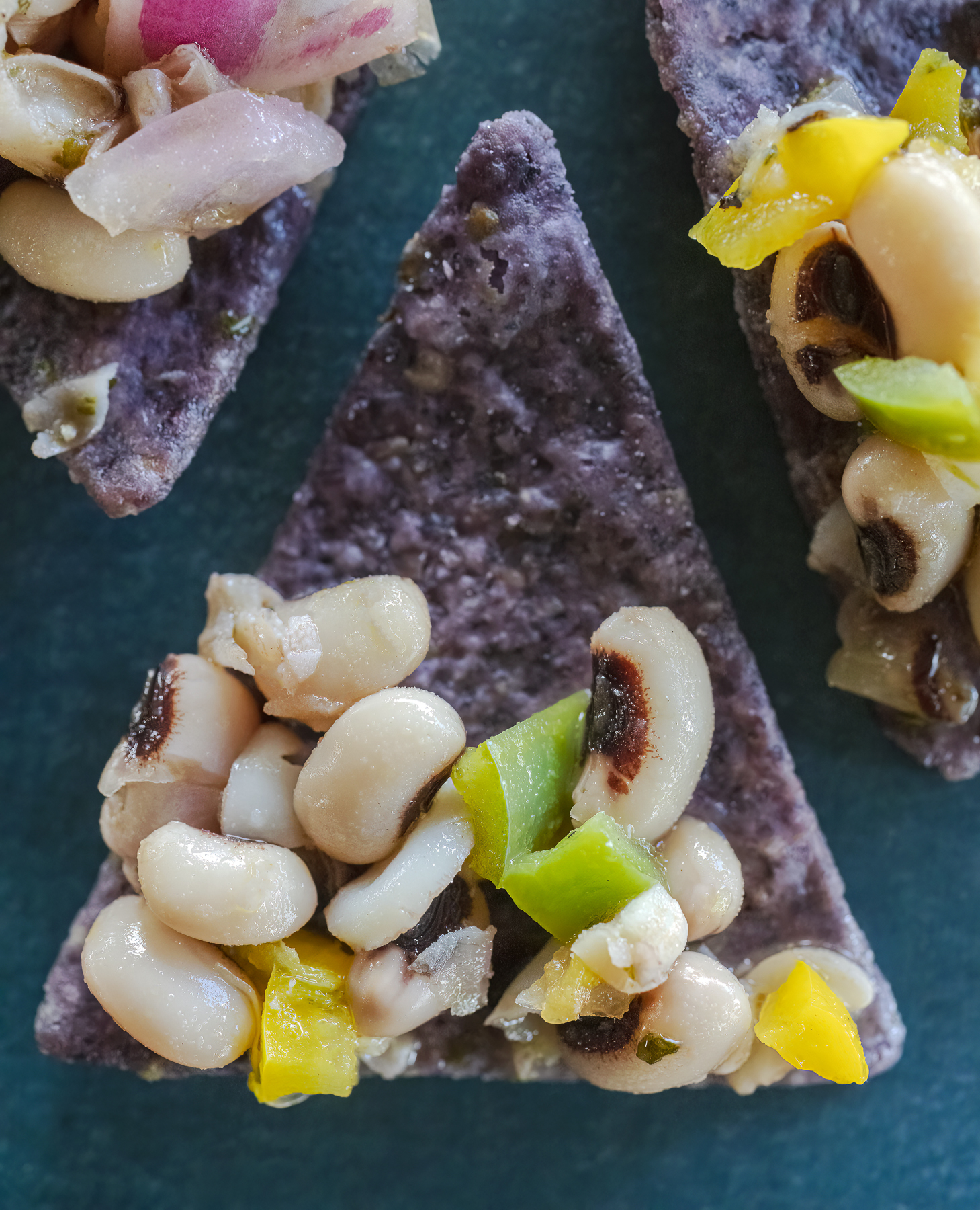 super lucky black-eyed peas cowboy caviar served on blue corn tortilla chips