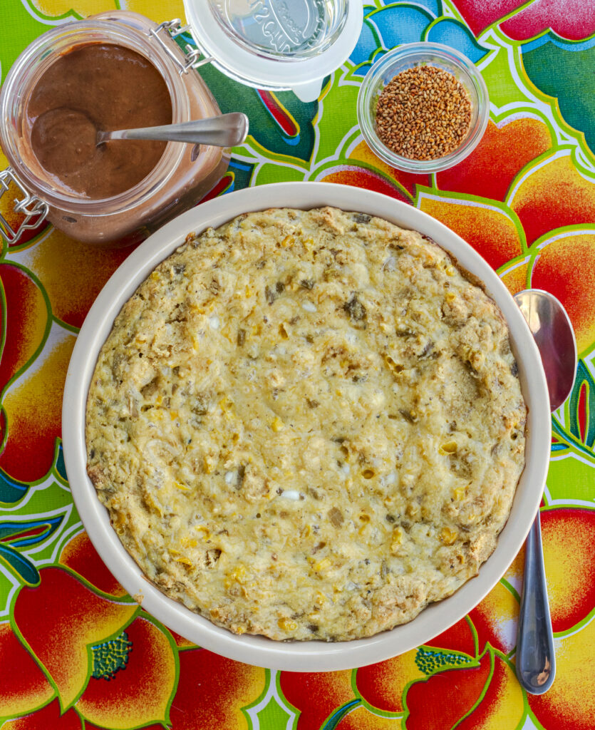 Sonoran green chile tamale pie with mole sauce by Taste of Tucson cookbook author Jackie Alpers
