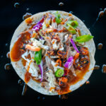 Peking-inspired Sonoran-style roast goose tacos with shredded cabbage, carrots, Salsa Macha and hoisin sauce. Food photography and recipe by Jackie Alpers.