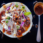 Peking-inspired Sonoran-style roast goose tacos with shredded cabbage, carrots, Salsa Macha and hoisin sauce. Food photography and recipe by Jackie Alpers.