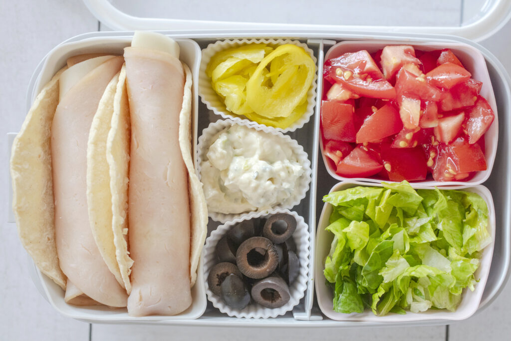 Scallion Ranch Cream cheese spread served with deli tacos bento box