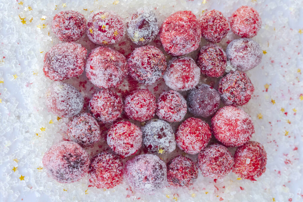 sugared cranberries coated in sparkling sugar and sprinkles. Recipe and photo by Jackie Alpers