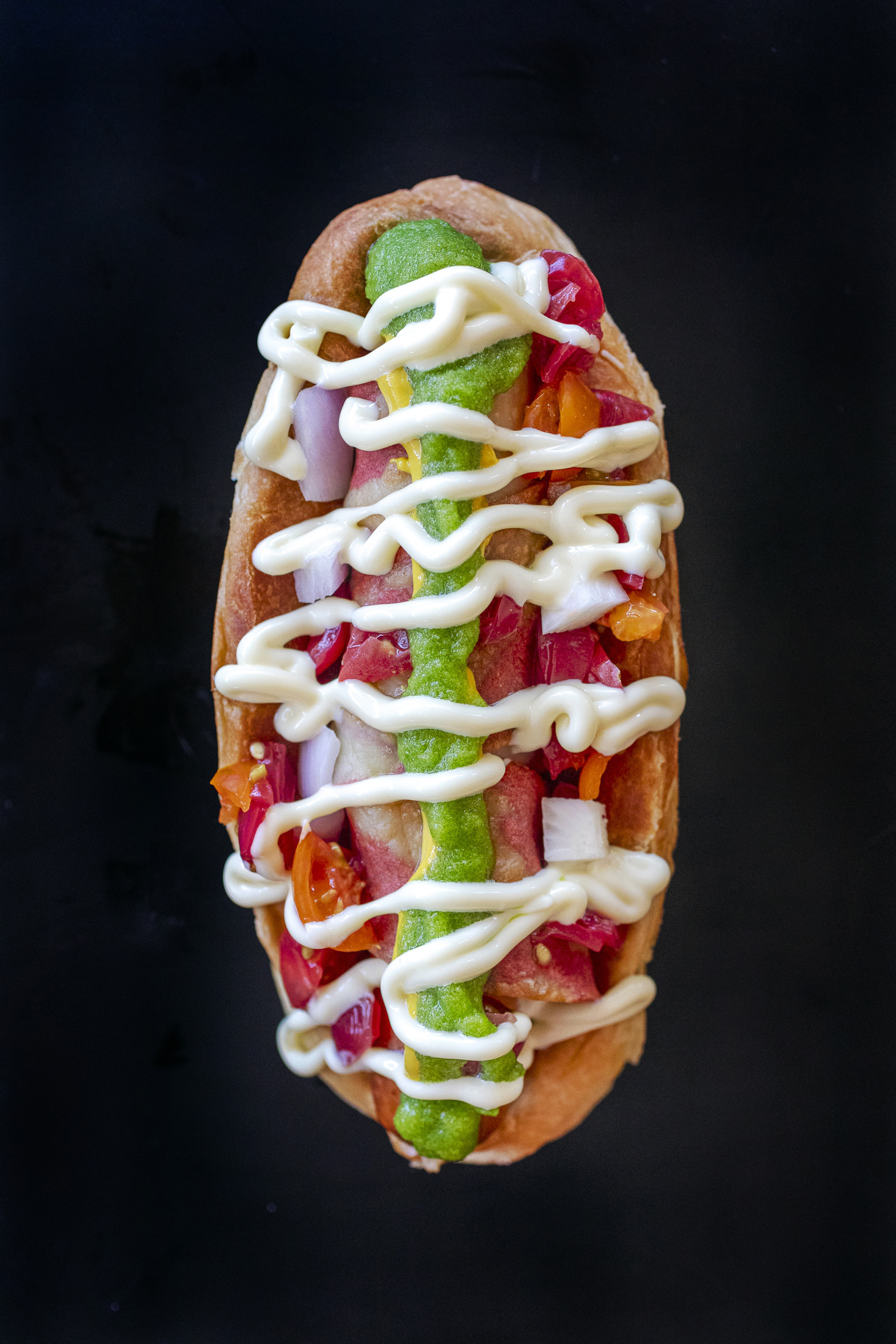 Sonoran hot dog recipe photo Jackie Alpers How to make the famous Sonoran hot dog with step-by-step instructions. From the Taste of Tucson cookbook by Jackie Alpers. Classics' Arizona chef, Daniel Contreras excerpt from the Taste of Tucson cookbook by Jackie Alpers.