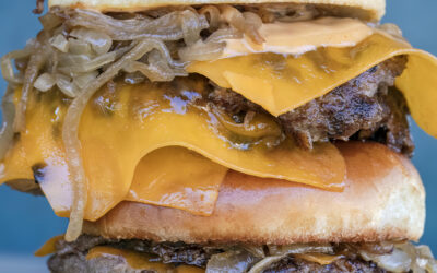 Double Smash Burgers with Cheese and Bourbon Braised Onions
