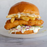 The Fish & Chips Sandwich is everything you love about fish & chips in sandwich form. Recipe and photo by Jackie Alpers for The Unofficial Elf Cookbook.