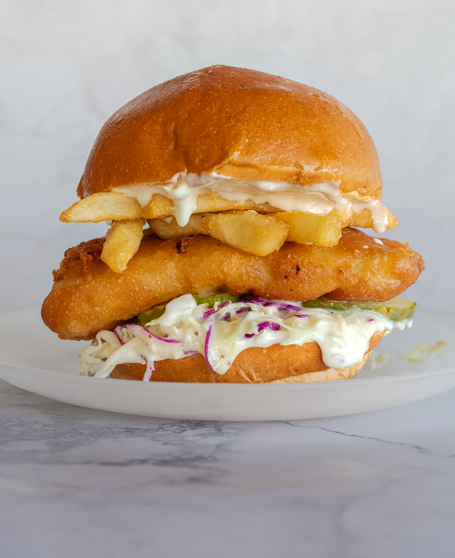 The Fish & Chips Sandwich is everything you love about fish & chips in sandwich form. Recipe and photo by Jackie Alpers for The Unofficial Elf Cookbook.